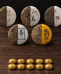 The Grand Pu-Erh Collection: five 100 g Sheng tea cakes, each shown half unwrapped, with 10 gold-wrapped Jin ke Shou portions