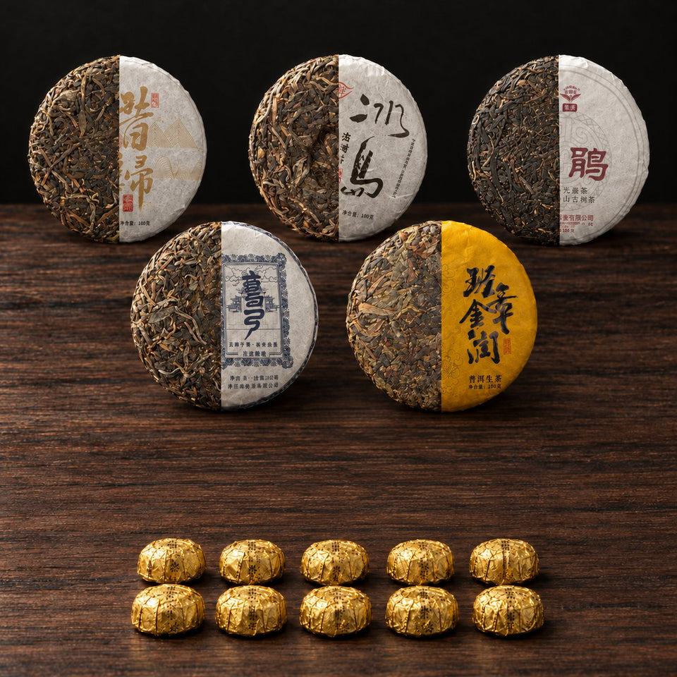 The Grand Pu-Erh Collection: five 100 g Sheng tea cakes, each shown half unwrapped, with 10 gold-wrapped Jin ke Shou portions