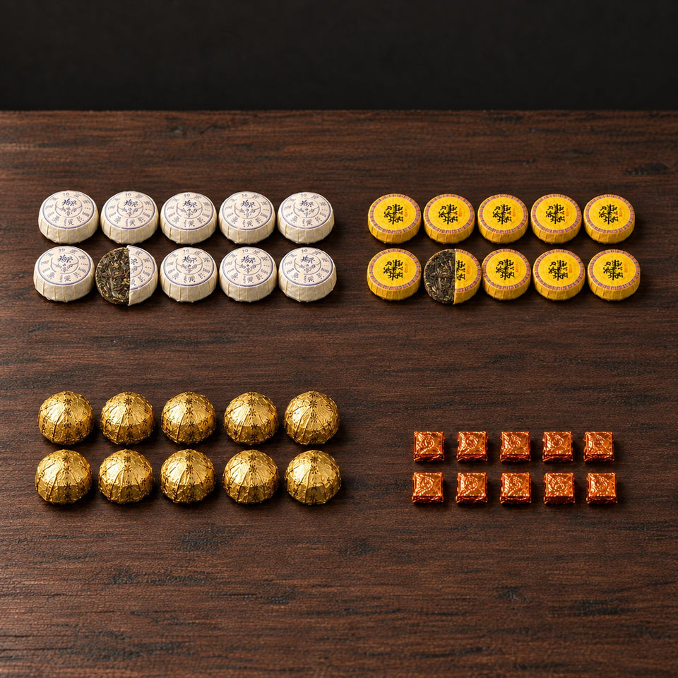 Pu-Erh Discovery Box: 10 Sticky Rice mini teas, 10 Honey Ban Zhang mini teas, 10 Jin ke portions and 10 Shazhi extract portions; one white and one yellow mini tea shown half unwrapped