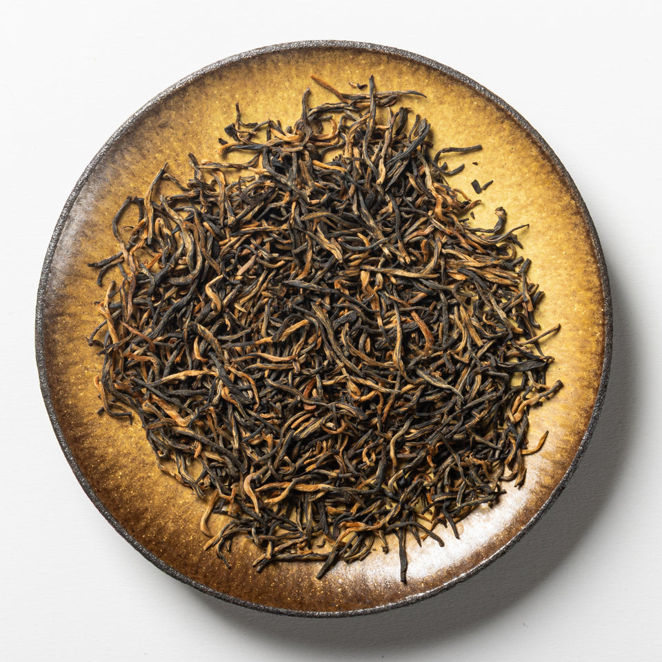 
Черный чай Цзинь Цзюнь Мэй «Золотые бутоны» из провинции Фуцзянь. Изображение 2